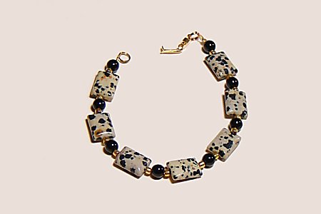 Genuine Dalmatian jasper with goldtone accents bracelet with foldover clasp